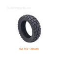 Black off-road tire with tread pattern on a white background, branded 'kukirinparts.eu'.